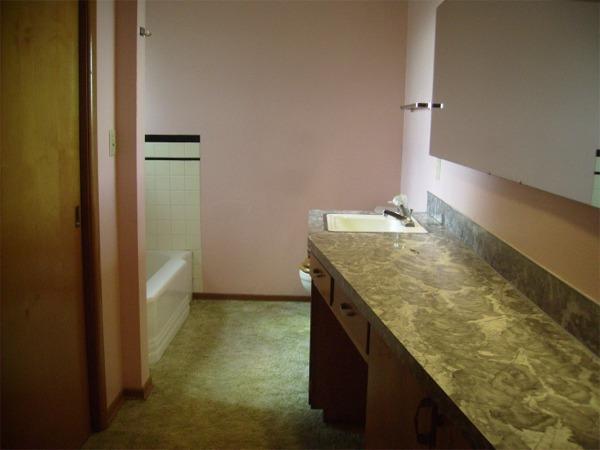 970 Kellum Road Outlook, WA 98938 - Photo 6 of 9 a bathroom with a granite countertop sink and a mirror