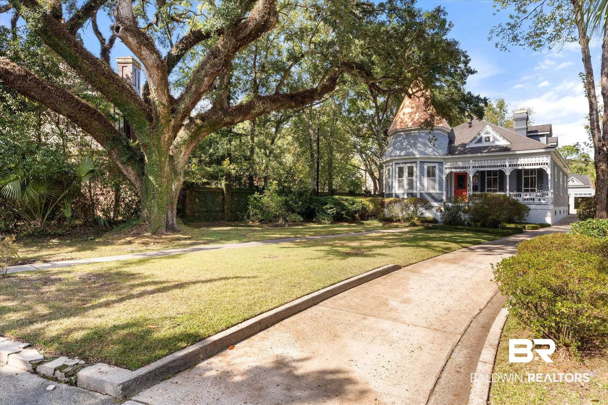 1210 Government Street Mobile, AL 36604 - Photo 37 of 37 View of front of house with covered porch and a front lawn