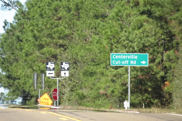 a sign broad on the side of the road