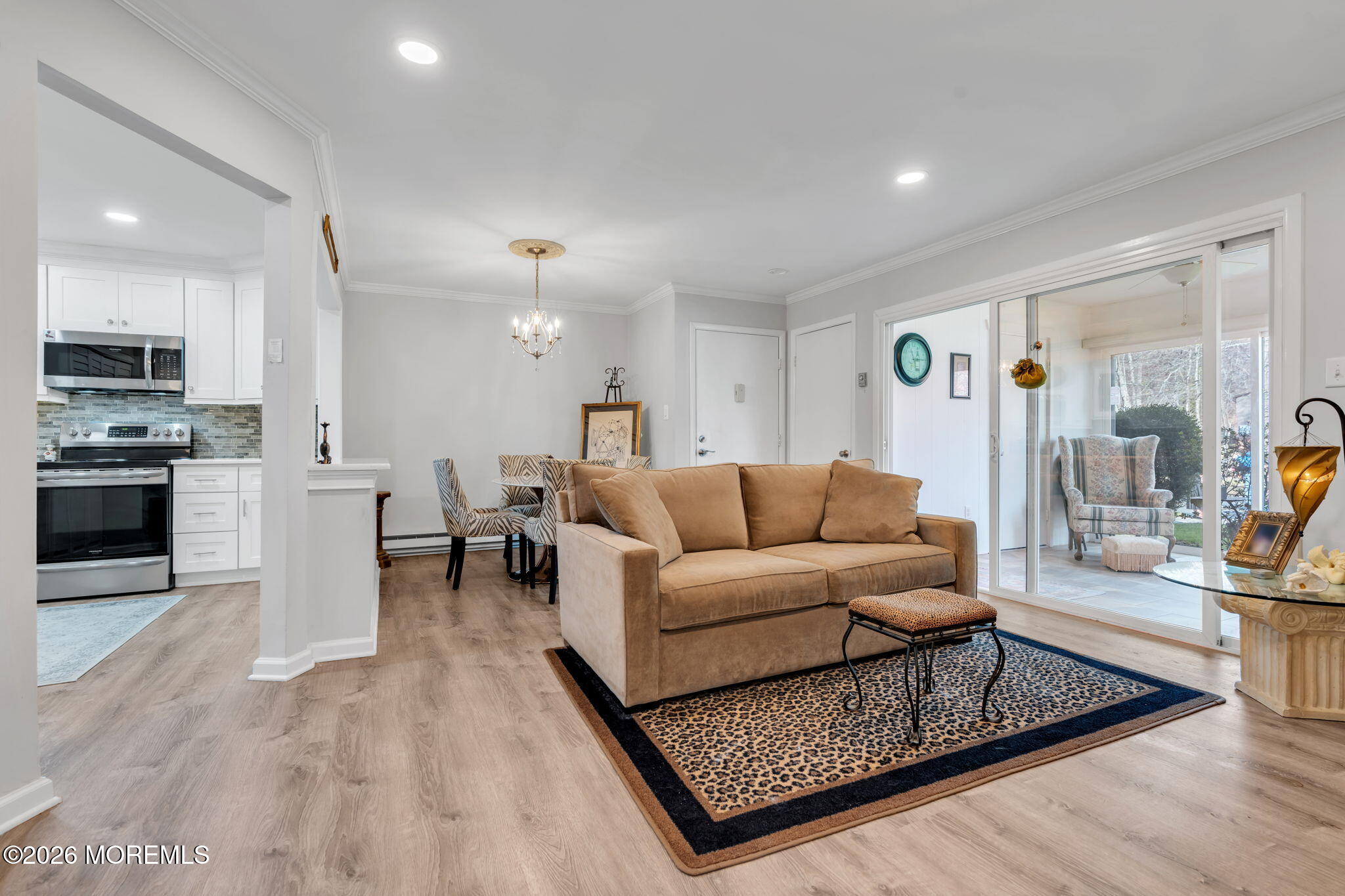 8 Manchester Court Red Bank, NJ 07701 - Photo 7 of 20 a living room with furniture and a wooden floor