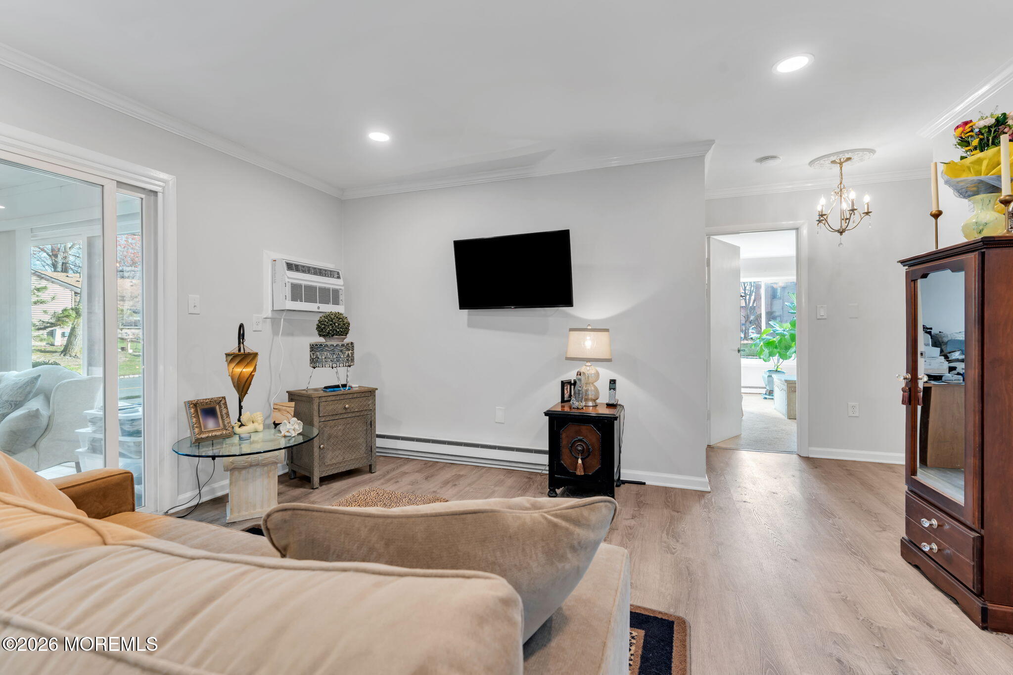 8 Manchester Court Red Bank, NJ 07701 - Photo 8 of 20 a living room with furniture and a flat screen tv