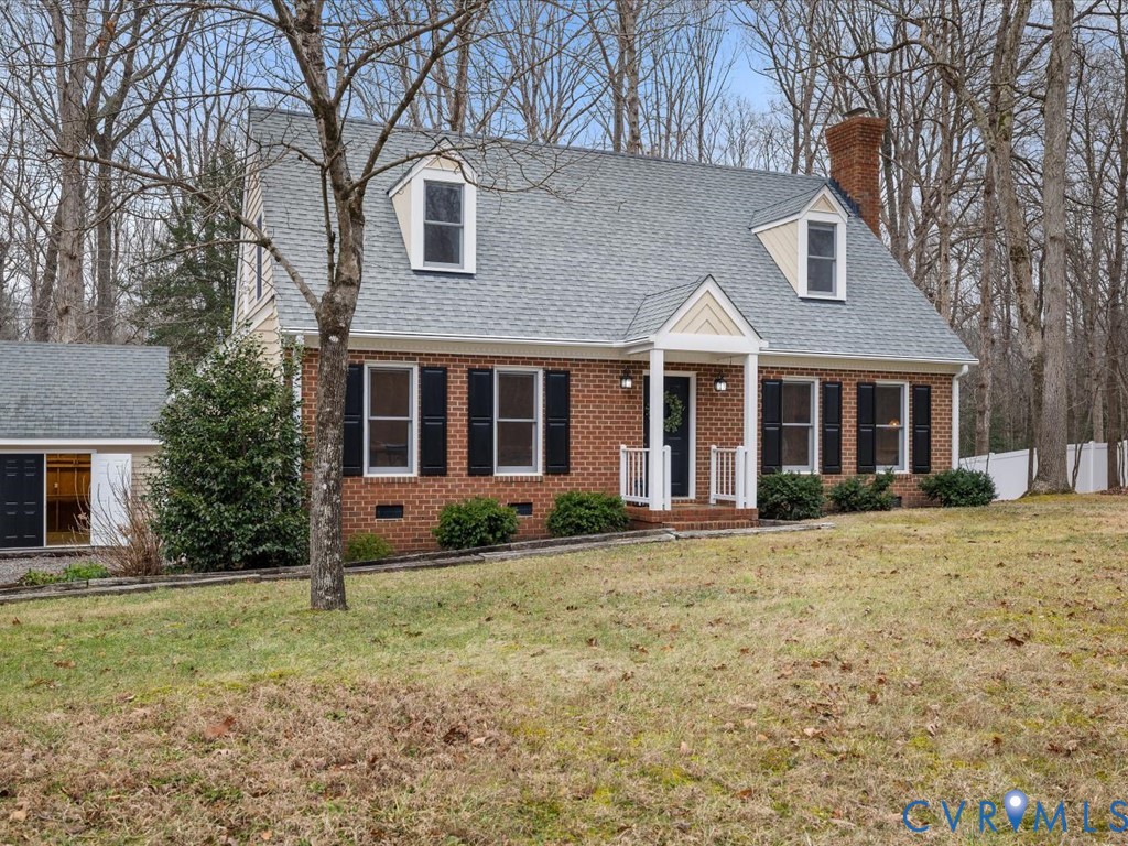 10221 North Donegal Road Chesterfield, VA 23832 - Photo 2 of 41 a front view of a house with garden