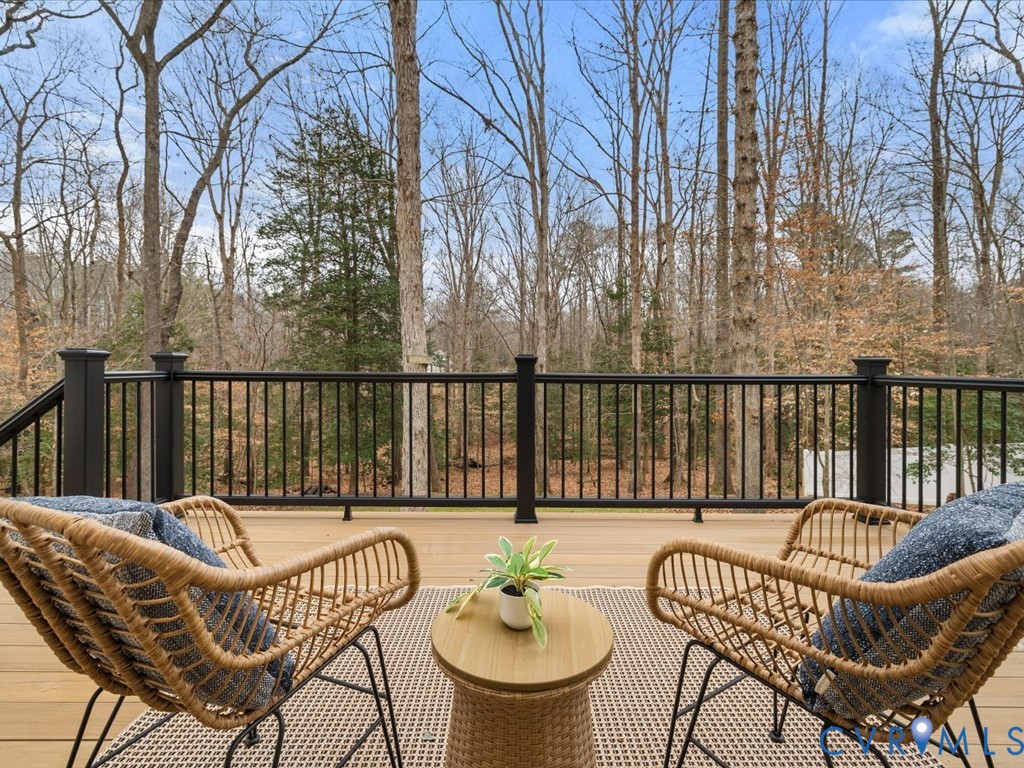 10221 North Donegal Road Chesterfield, VA 23832 - Photo 31 of 41 a balcony with table and chairs