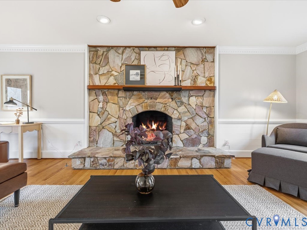 10221 North Donegal Road Chesterfield, VA 23832 - Photo 8 of 41 a living room with fireplace furniture and a wooden floor