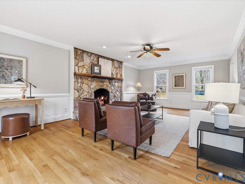 10221 North Donegal Road Chesterfield, VA 23832 - Photo 10 of 41 a living room with furniture and a fireplace