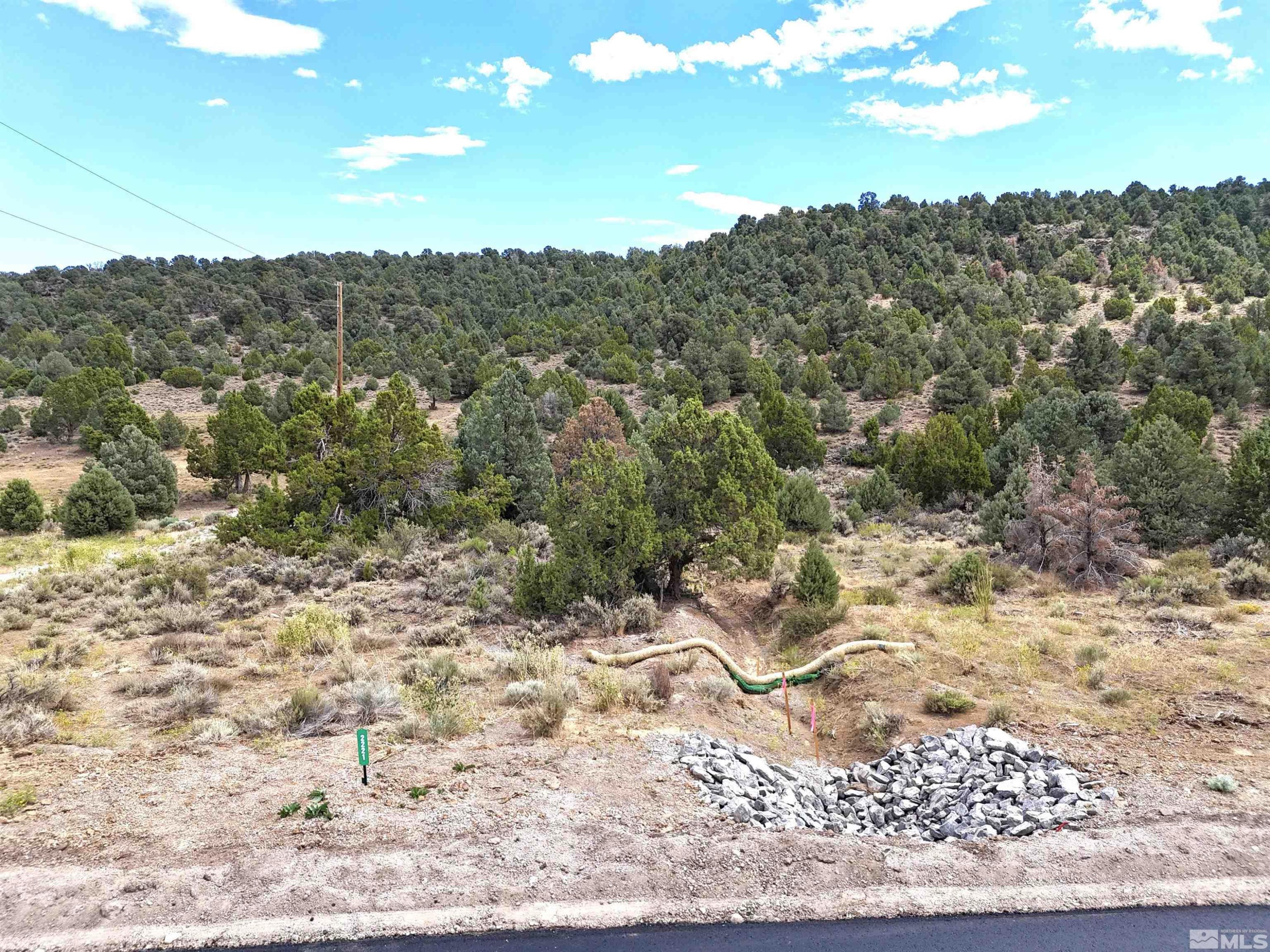 2221 Lousetown Road Reno, NV 89521 - Photo 8 of 26 a view of a dry yard with wooden fence