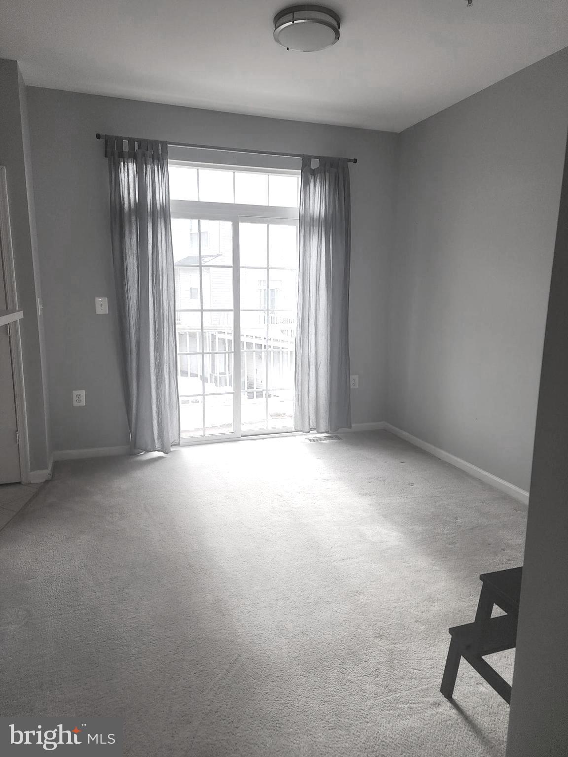 556 Rhapsody Court Hunt Valley, MD 21030 - Photo 11 of 38 an empty room with windows and closet