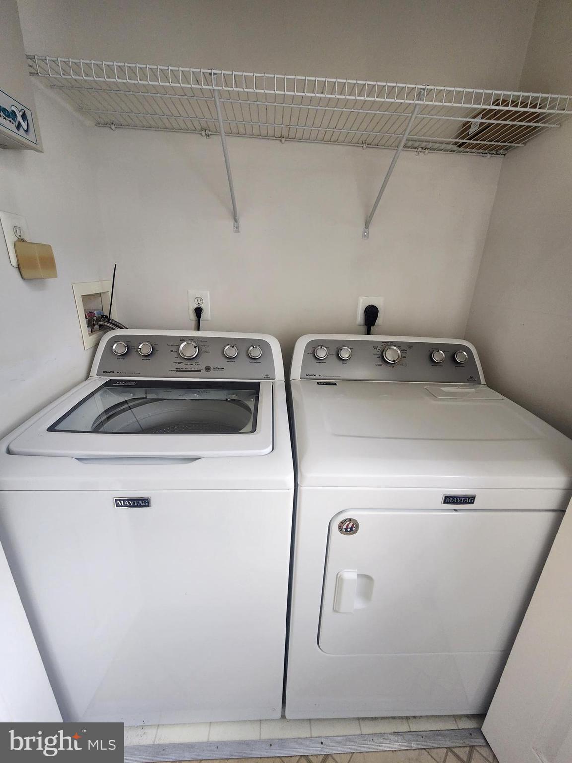 556 Rhapsody Court Hunt Valley, MD 21030 - Photo 18 of 38 a utility room with dryer and washer