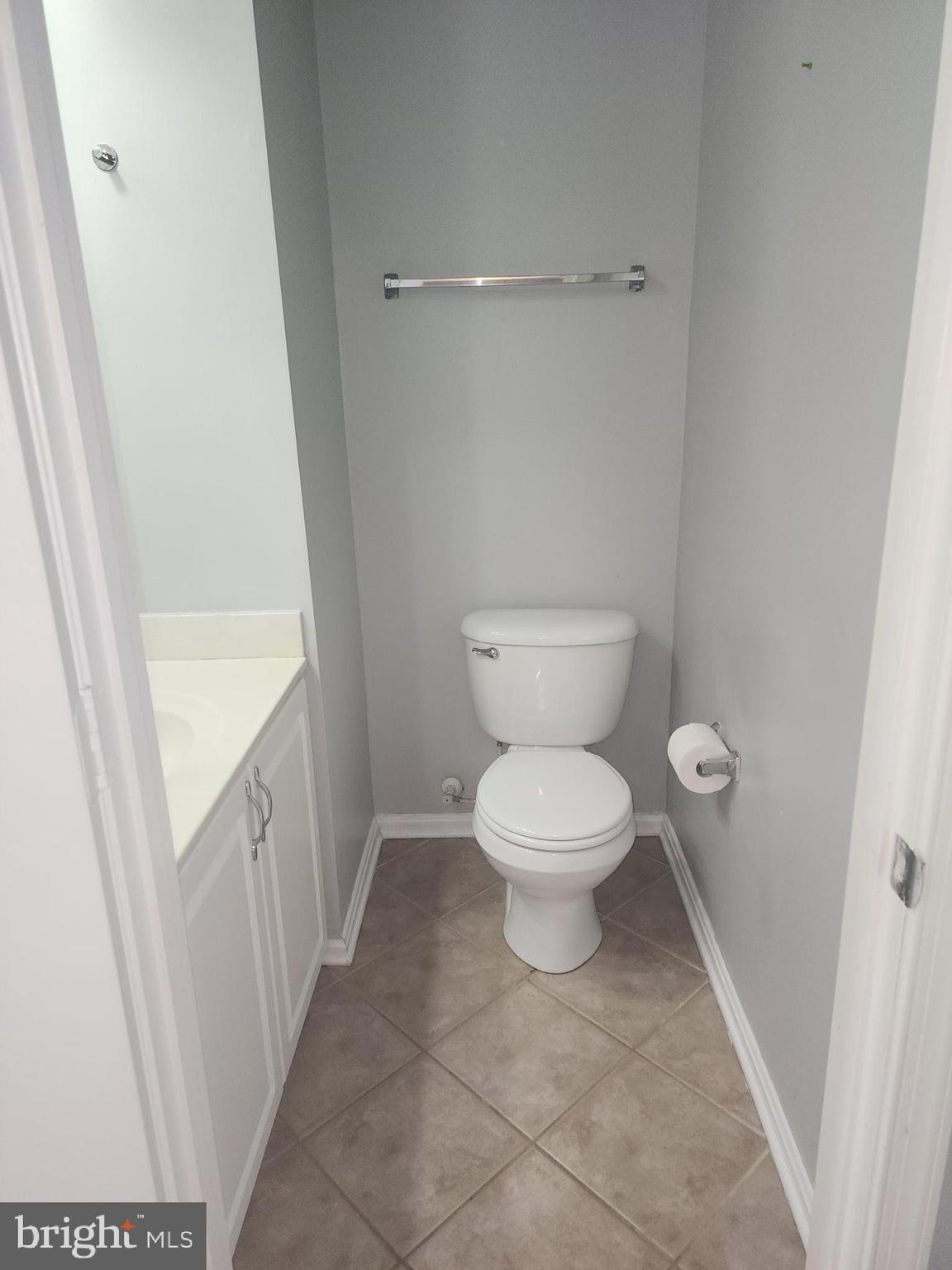 556 Rhapsody Court Hunt Valley, MD 21030 - Photo 21 of 38 a bathroom with a toilet and a sink