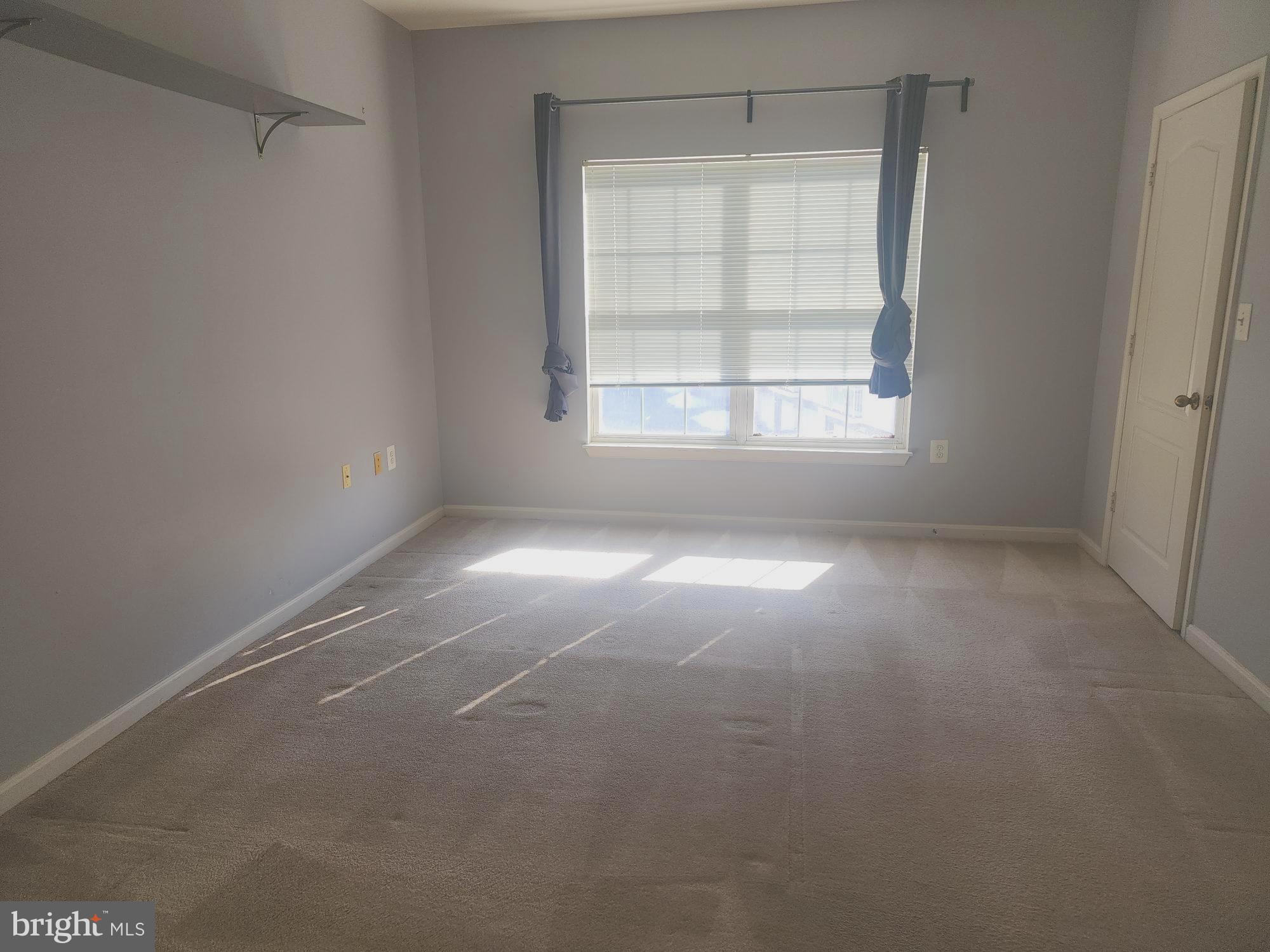 556 Rhapsody Court Hunt Valley, MD 21030 - Photo 25 of 38 a view of empty room with windows