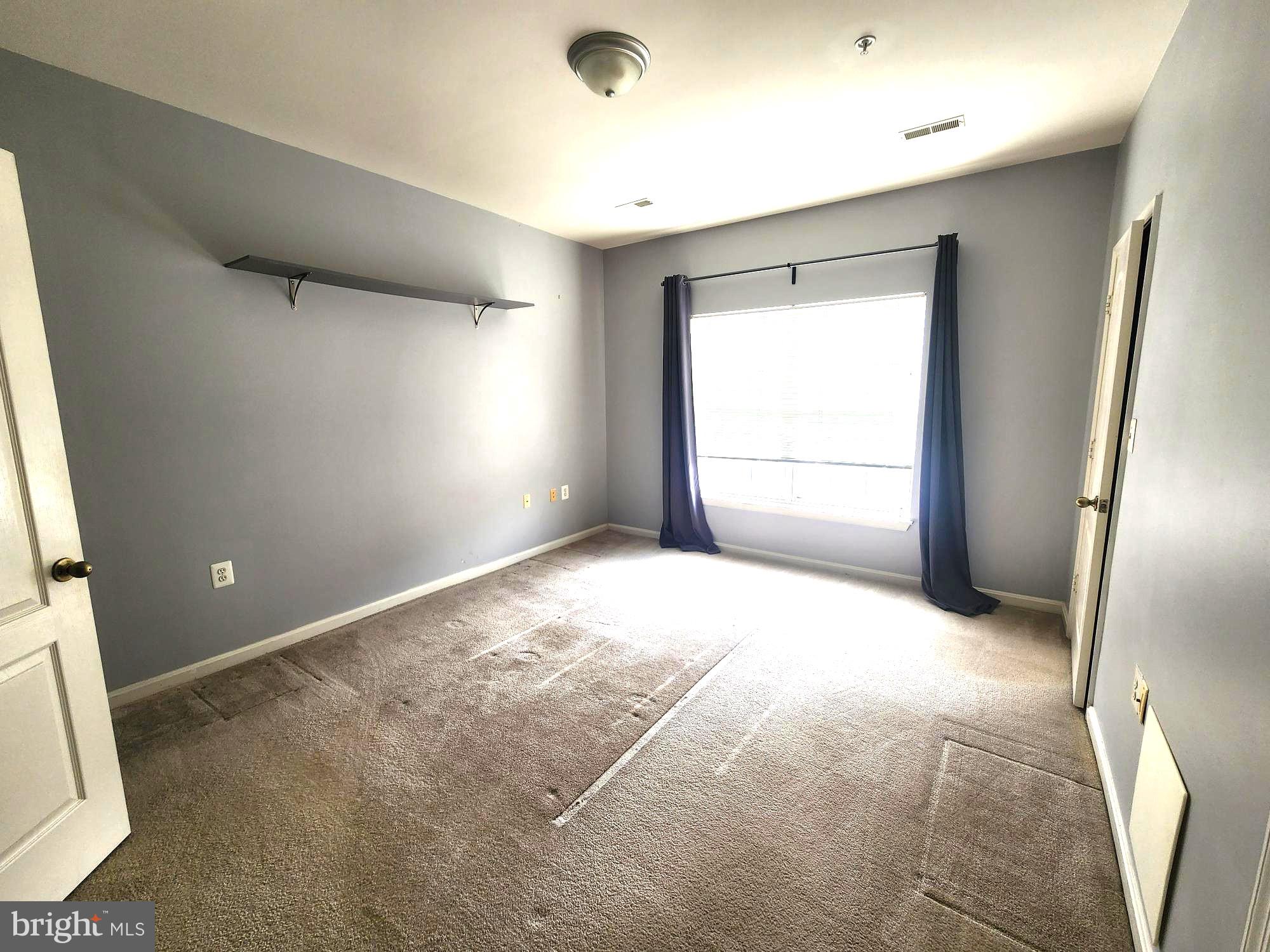 556 Rhapsody Court Hunt Valley, MD 21030 - Photo 26 of 38 a view of an empty room with a window