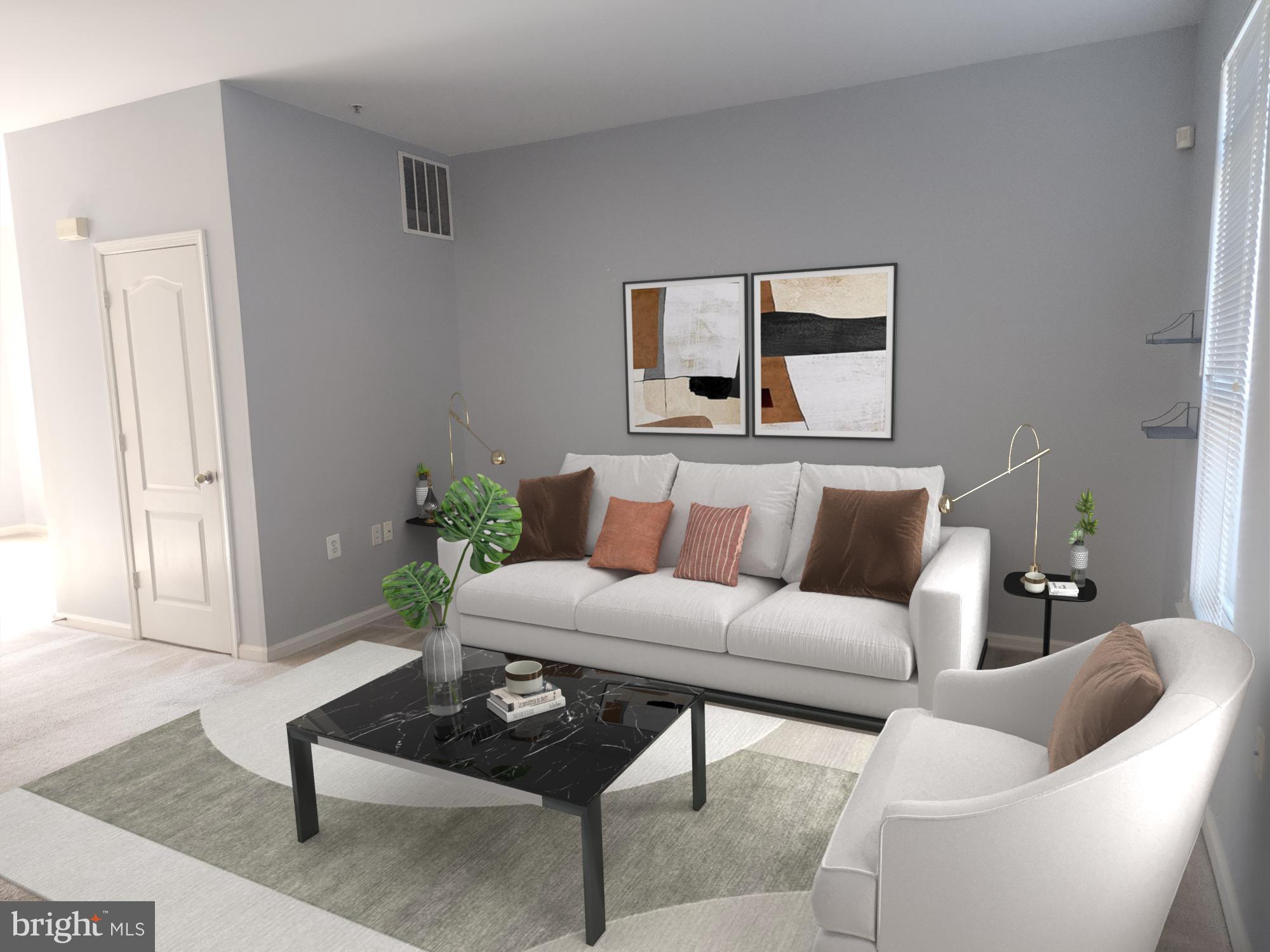 556 Rhapsody Court Hunt Valley, MD 21030 - Photo 4 of 38 a living room with furniture a rug and a window