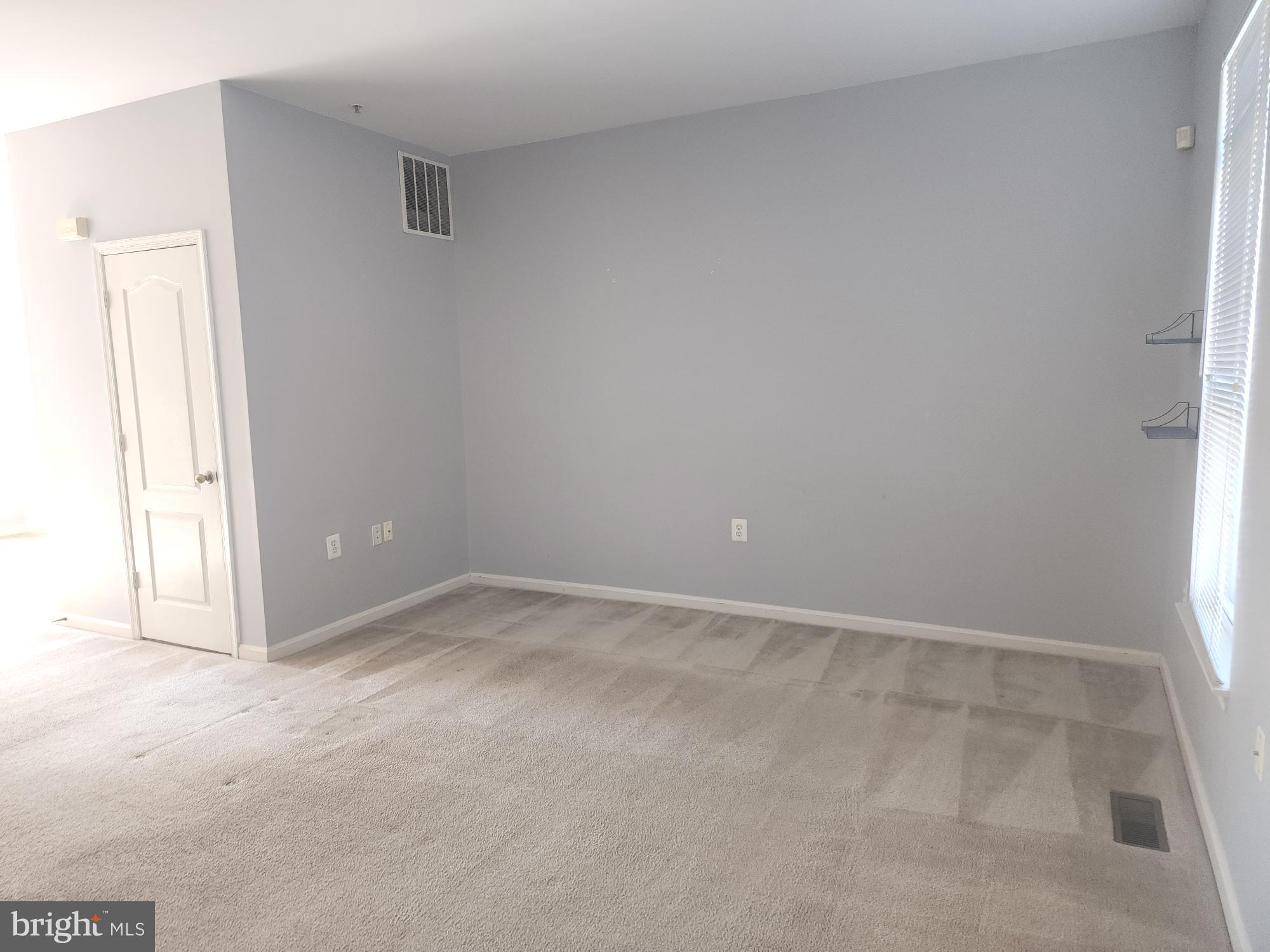 556 Rhapsody Court Hunt Valley, MD 21030 - Photo 5 of 38 an empty room with windows
