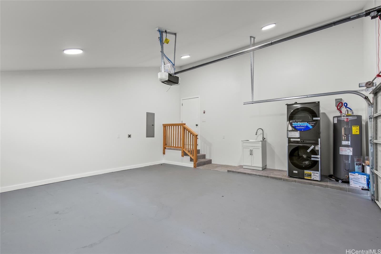 907 Ahuwale Street Honolulu, HI 96821 - Photo 21 of 25 Large Garage area/ Washer and dryer