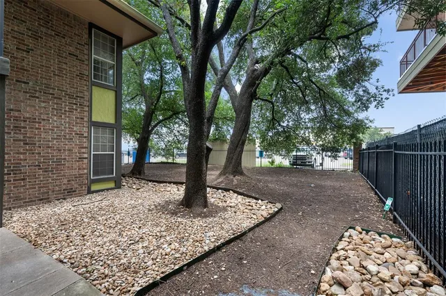 a view of a house with tree s
