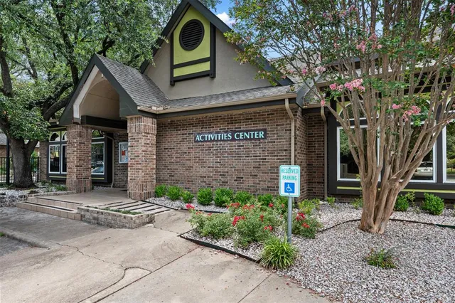 a table and chairs in a garden