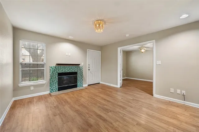 a view of a kitchen counter space and dining room
