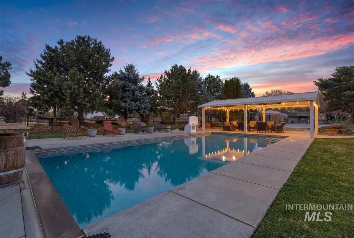 264 West Rush Court Eagle, ID 83616 - Photo 1 of 46 Outdoor pool featuring a patio and outdoor lounge area