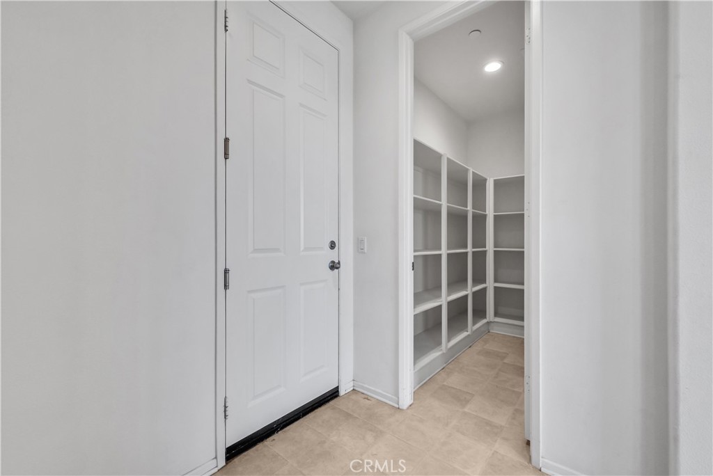 29157 Sunforest Lake Elsinore, CA 92530 - Photo 15 of 39 a view of empty room with entryway and window