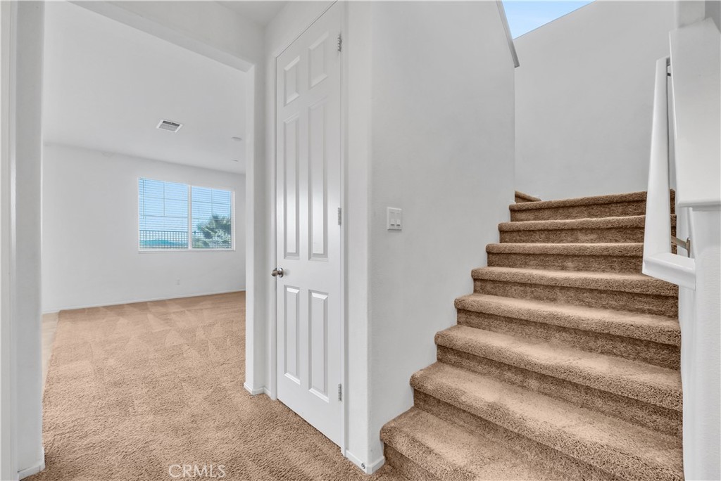 29157 Sunforest Lake Elsinore, CA 92530 - Photo 17 of 39 a view of entryway with wooden floor