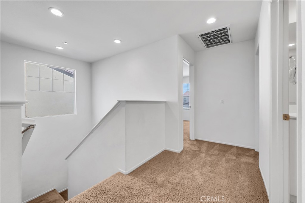 29157 Sunforest Lake Elsinore, CA 92530 - Photo 18 of 39 a view of hallway with stairs