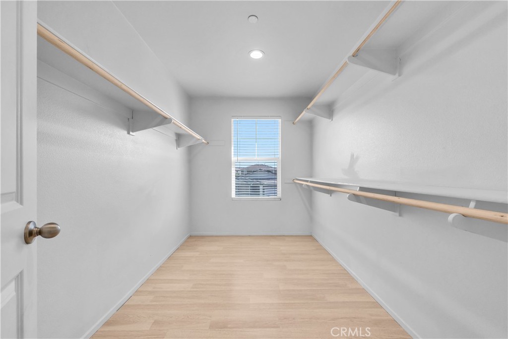 29157 Sunforest Lake Elsinore, CA 92530 - Photo 26 of 39 a view of a hallway with a white walls