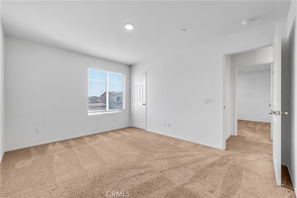 29157 Sunforest Lake Elsinore, CA 92530 - Photo 29 of 39 a view of an empty room with a window