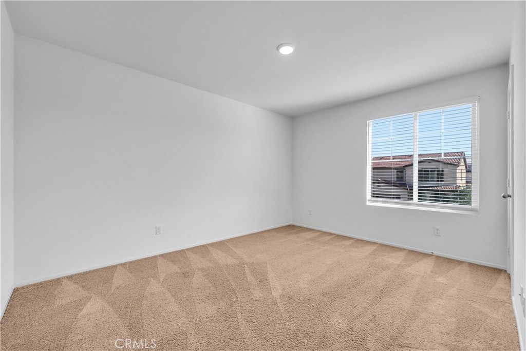 29157 Sunforest Lake Elsinore, CA 92530 - Photo 30 of 39 an empty room with a window