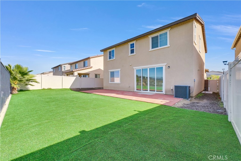 29157 Sunforest Lake Elsinore, CA 92530 - Photo 36 of 39 a view of a backyard with plants and a backyard