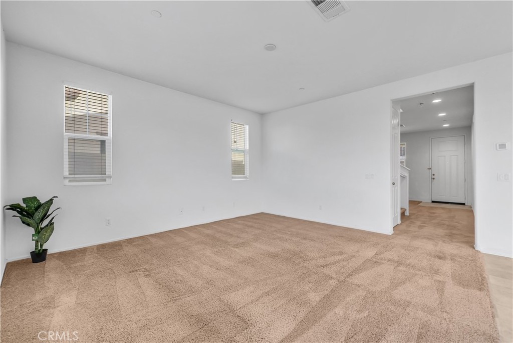 29157 Sunforest Lake Elsinore, CA 92530 - Photo 7 of 39 a view of an empty room with a window