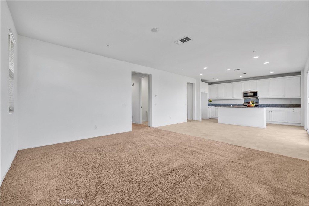 29157 Sunforest Lake Elsinore, CA 92530 - Photo 8 of 39 a view of a kitchen with a sink