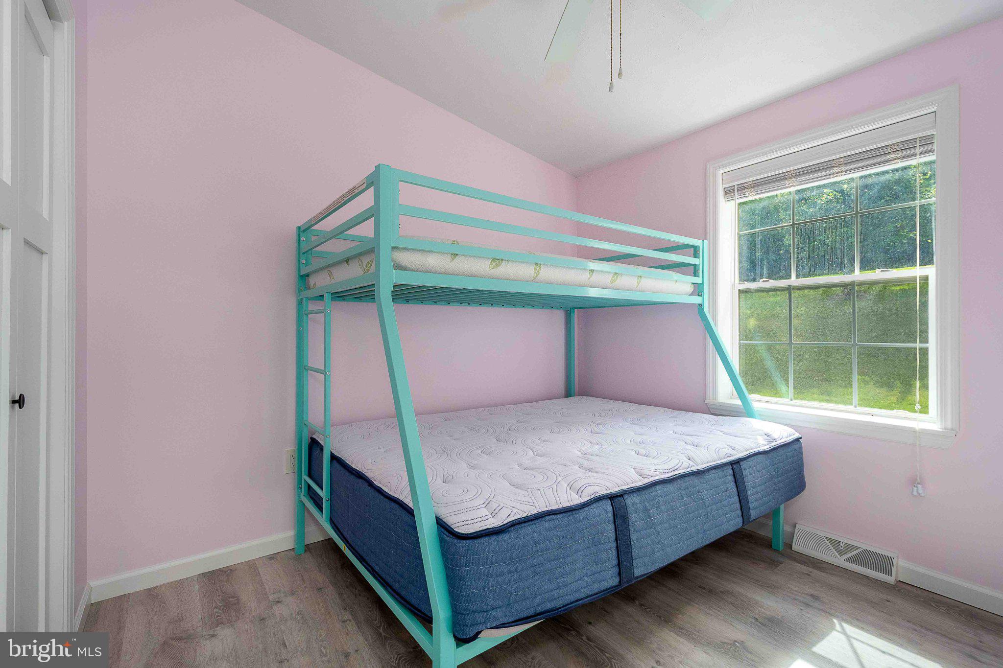 511 Hill Top Road Oakland, MD 21550 - Photo 33 of 51 Charming bunk bed in pastel haven.