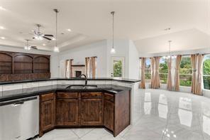 238 Rudder Road Gun Barrel City, TX 75156 - Photo 8 of 27 a kitchen with stainless steel appliances granite countertop a sink a stove and a window