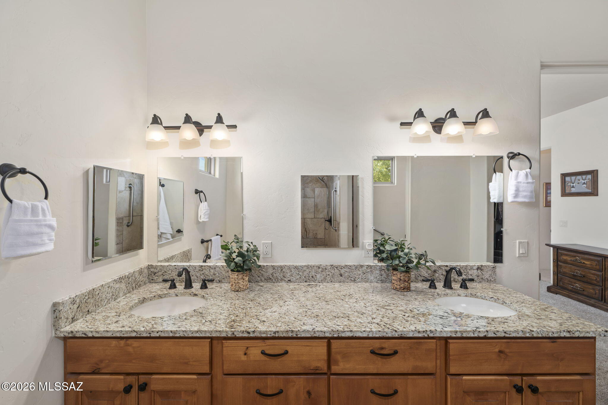 45 High View Court Tubac, AZ 85646 - Photo 26 of 44 a bathroom with a granite countertop sink and a mirror