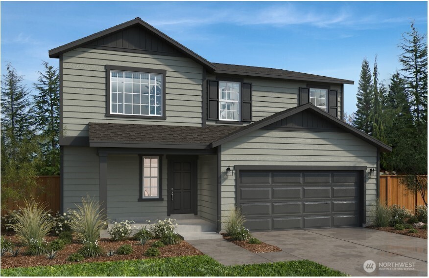 912 Smith Street, Unit 64 Buckley, WA 98321 - Photo 1 of 4 a front view of a house with garden