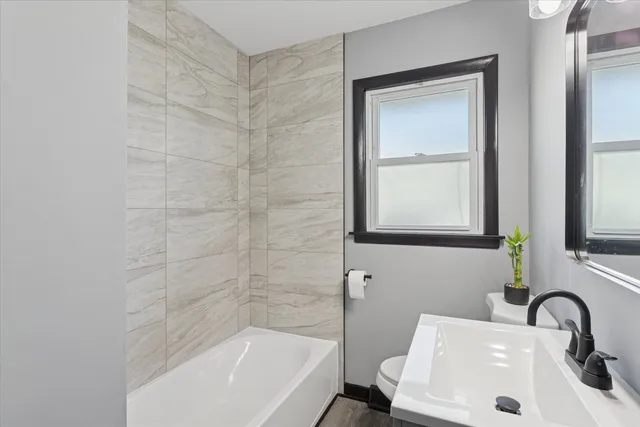 a bathroom with a sink and a bathtub