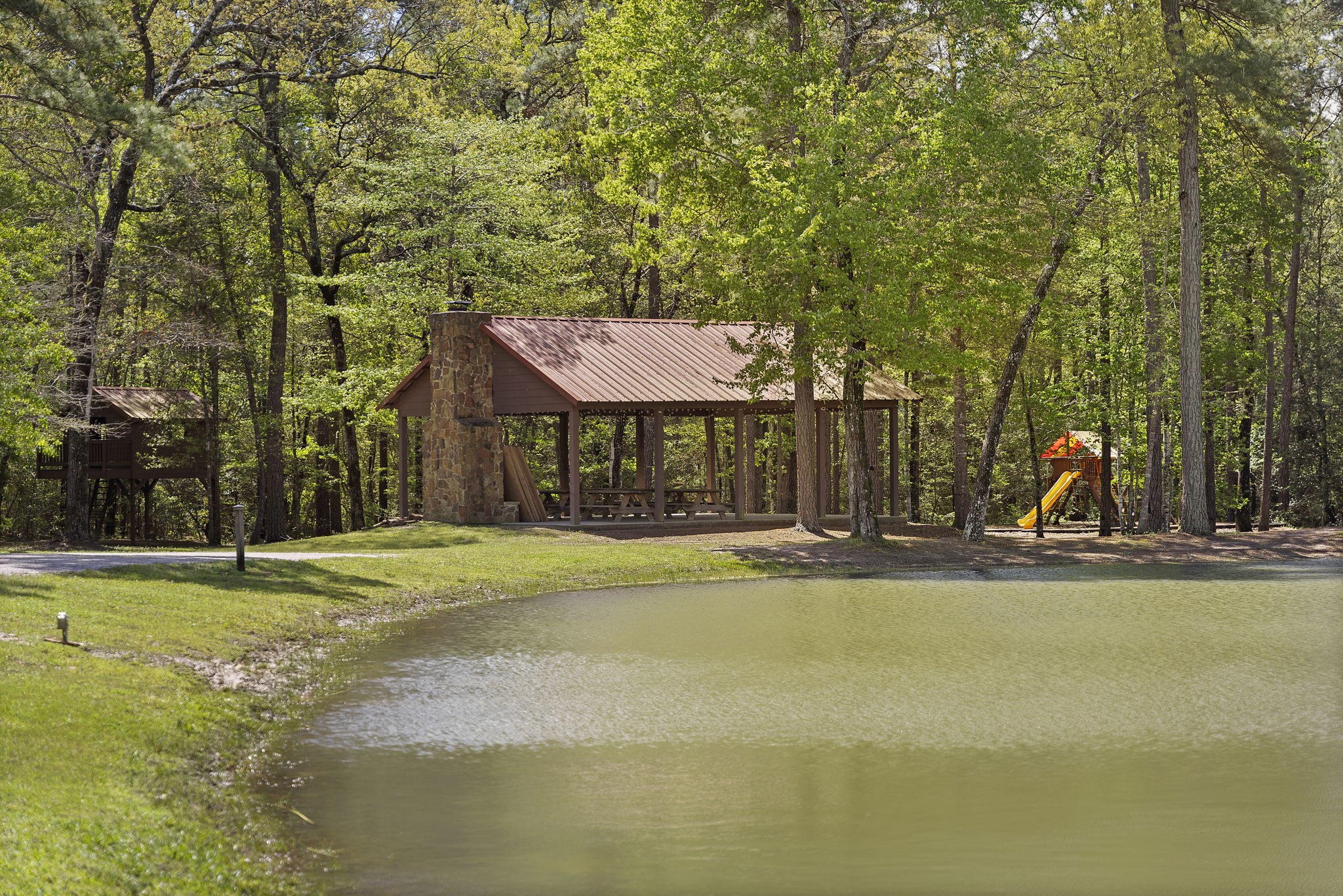 9-17-3b Winchester Road Huntsville, TX 77340 - Photo 19 of 27 a view of a house with swimming pool and a yard