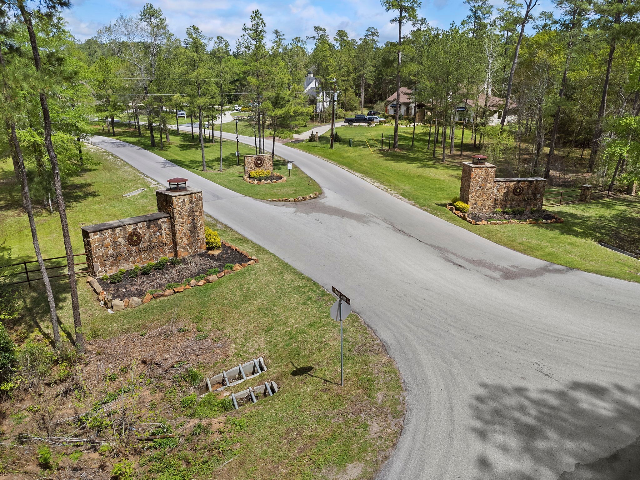 9-17-3b Winchester Road Huntsville, TX 77340 - Photo 8 of 27 an aerial view of a house with a yard basket ball court and outdoor seating