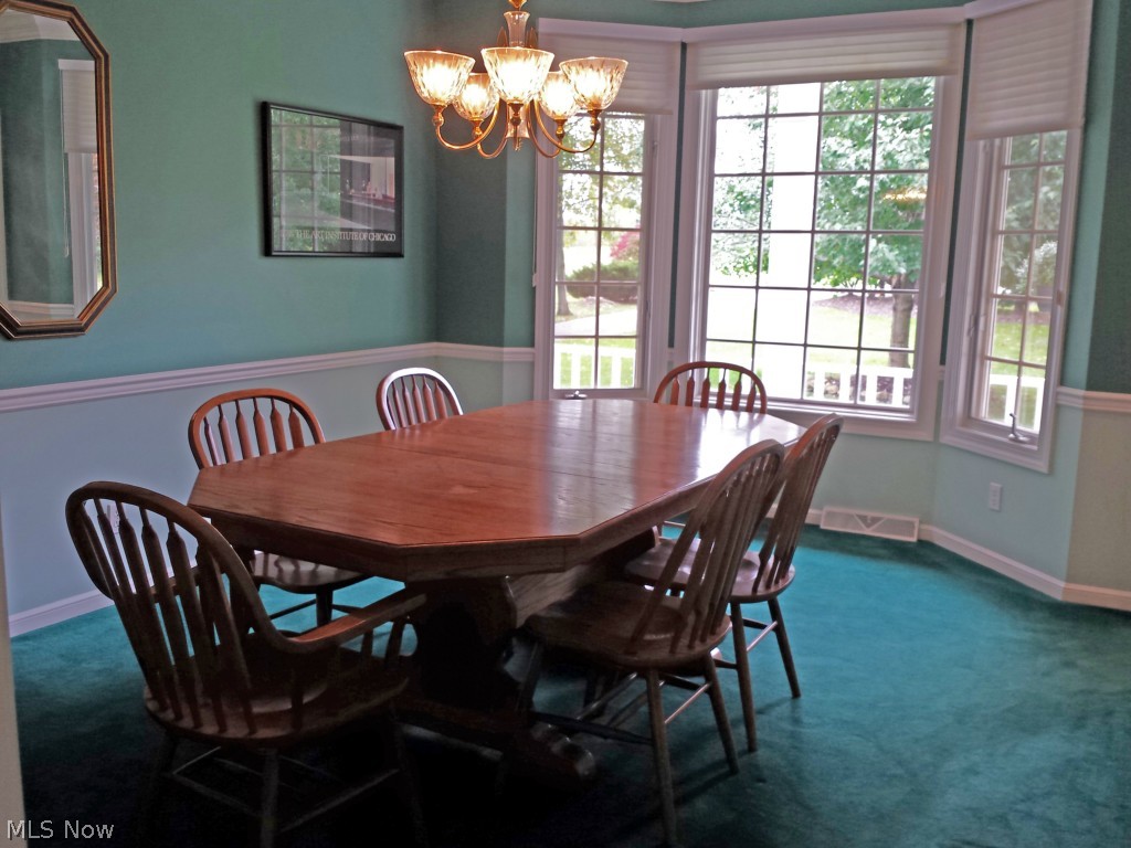 991 Bell Road South Russell, OH 44022 - Photo 7 of 25 Formal dining room with bayed window