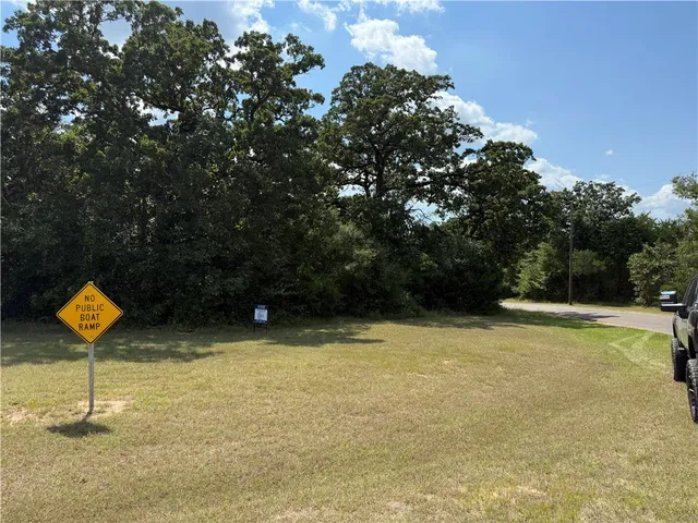 a view of a swimming pool with a bench