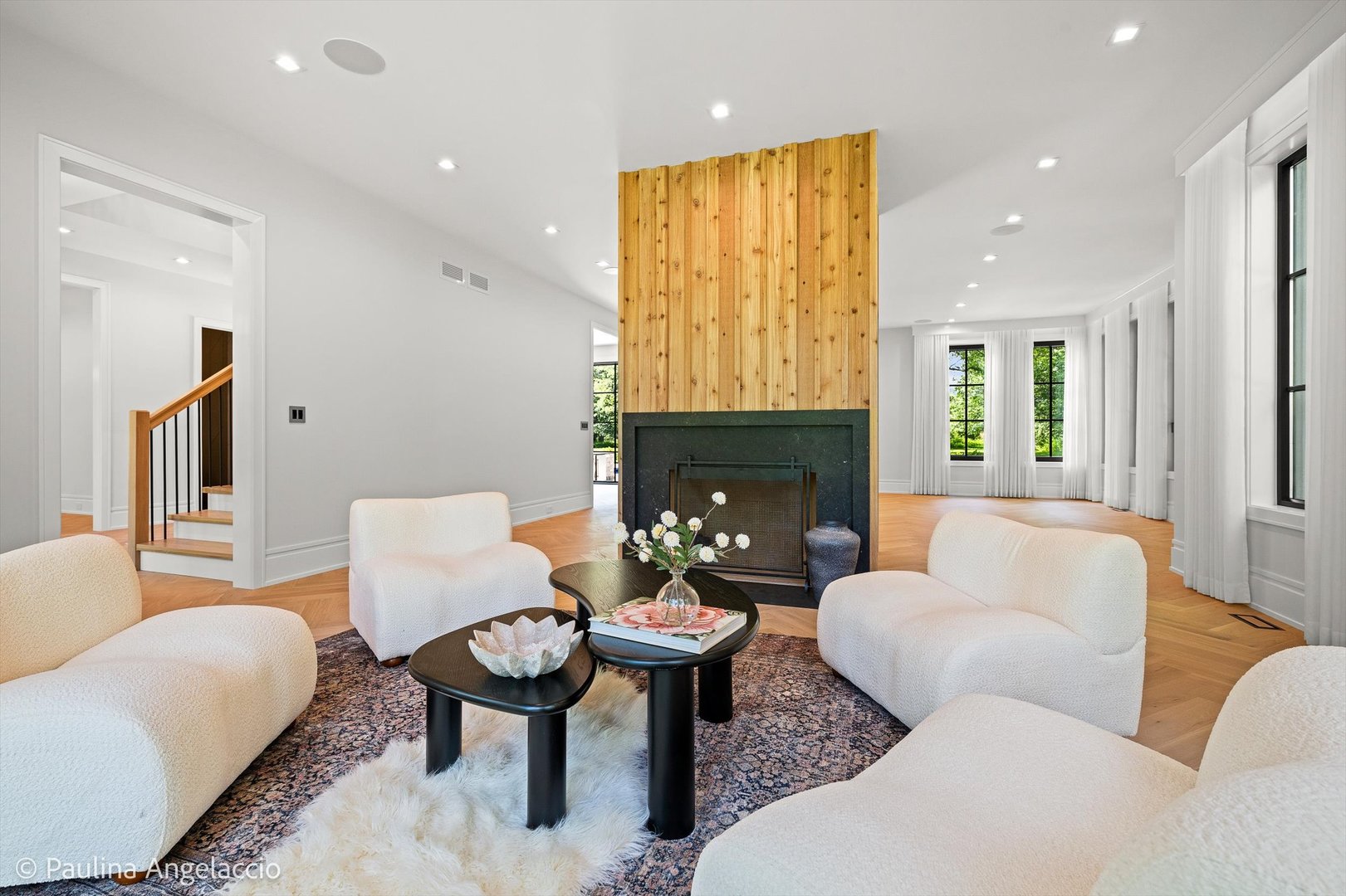 699 Plum Tree Road Barrington Hills, IL 60010 - Photo 13 of 84 a living room with furniture a fireplace and a table