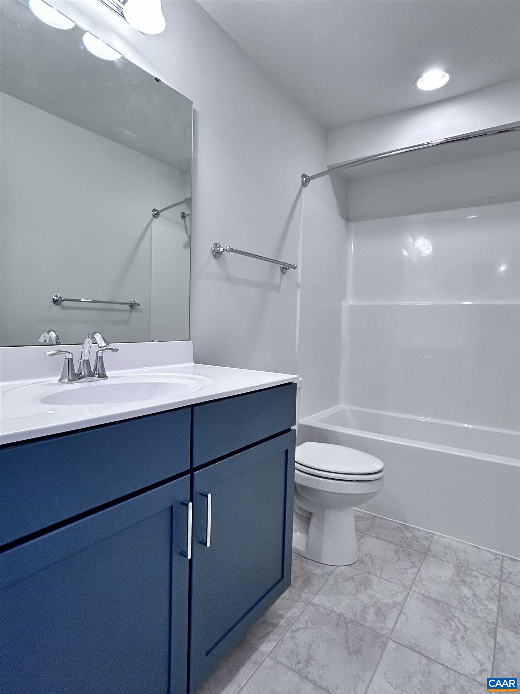 103 Keene Court Charlottesville, VA 22903 - Photo 15 of 18 a bathroom with a sink toilet and shower