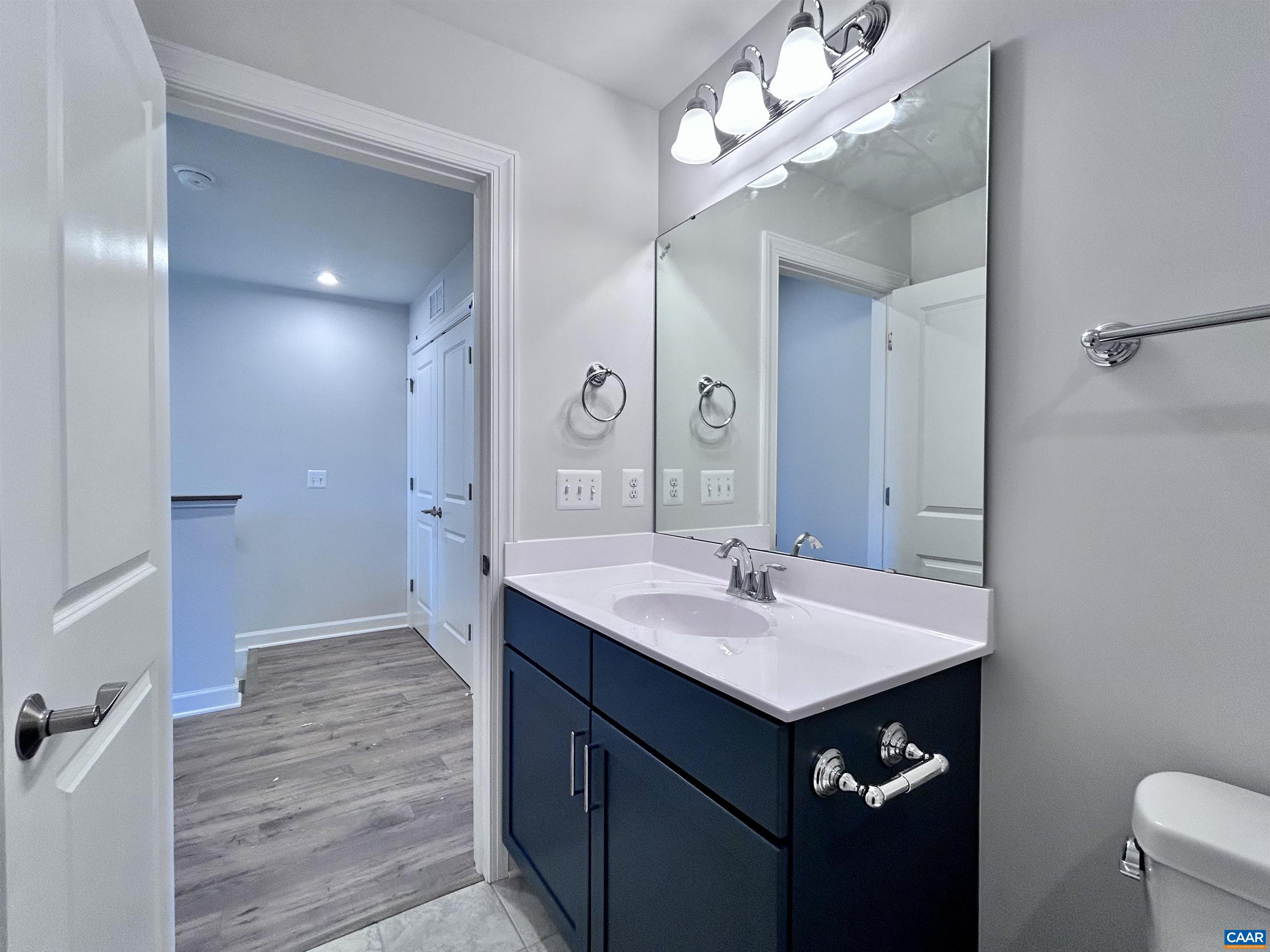 103 Keene Court Charlottesville, VA 22903 - Photo 16 of 18 a bathroom with a sink a toilet and shower