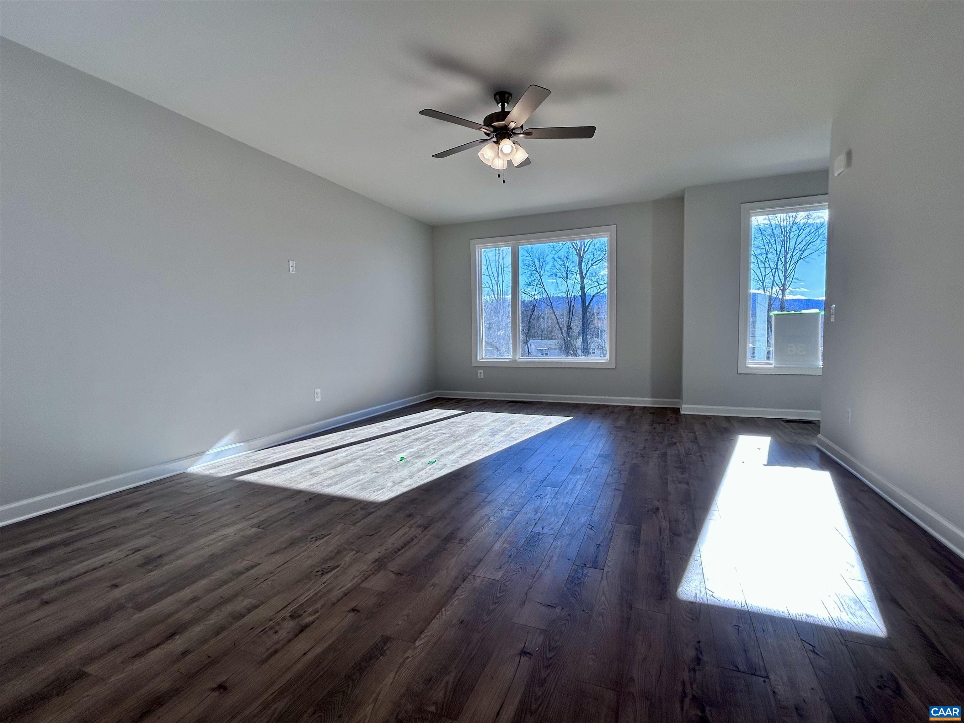 103 Keene Court Charlottesville, VA 22903 - Photo 10 of 18 wooden floor in an empty room with a window