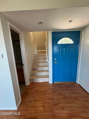a view of entryway with wooden floor