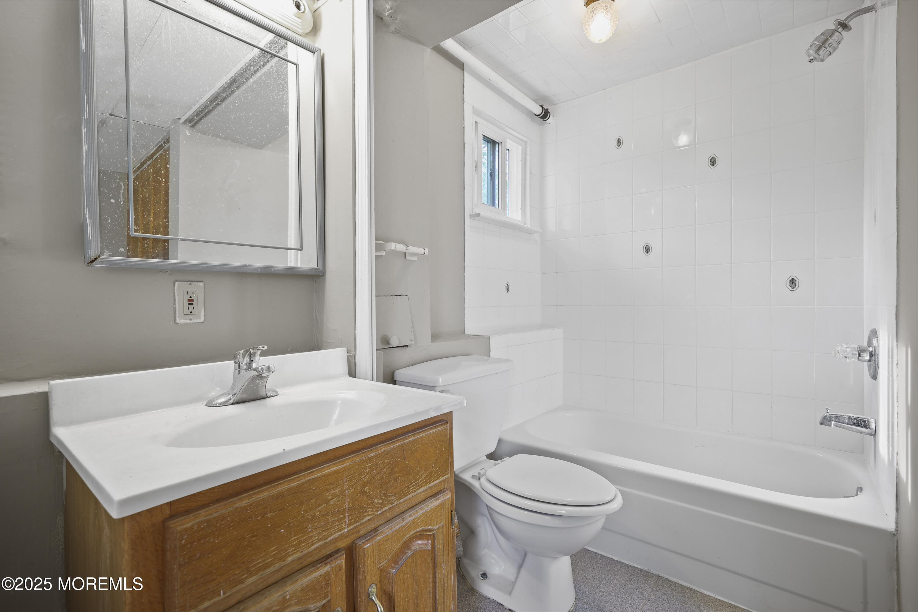 12 Mayfair Road Holmdel, NJ 07733 - Photo 16 of 38 a bathroom with a sink a toilet and shower