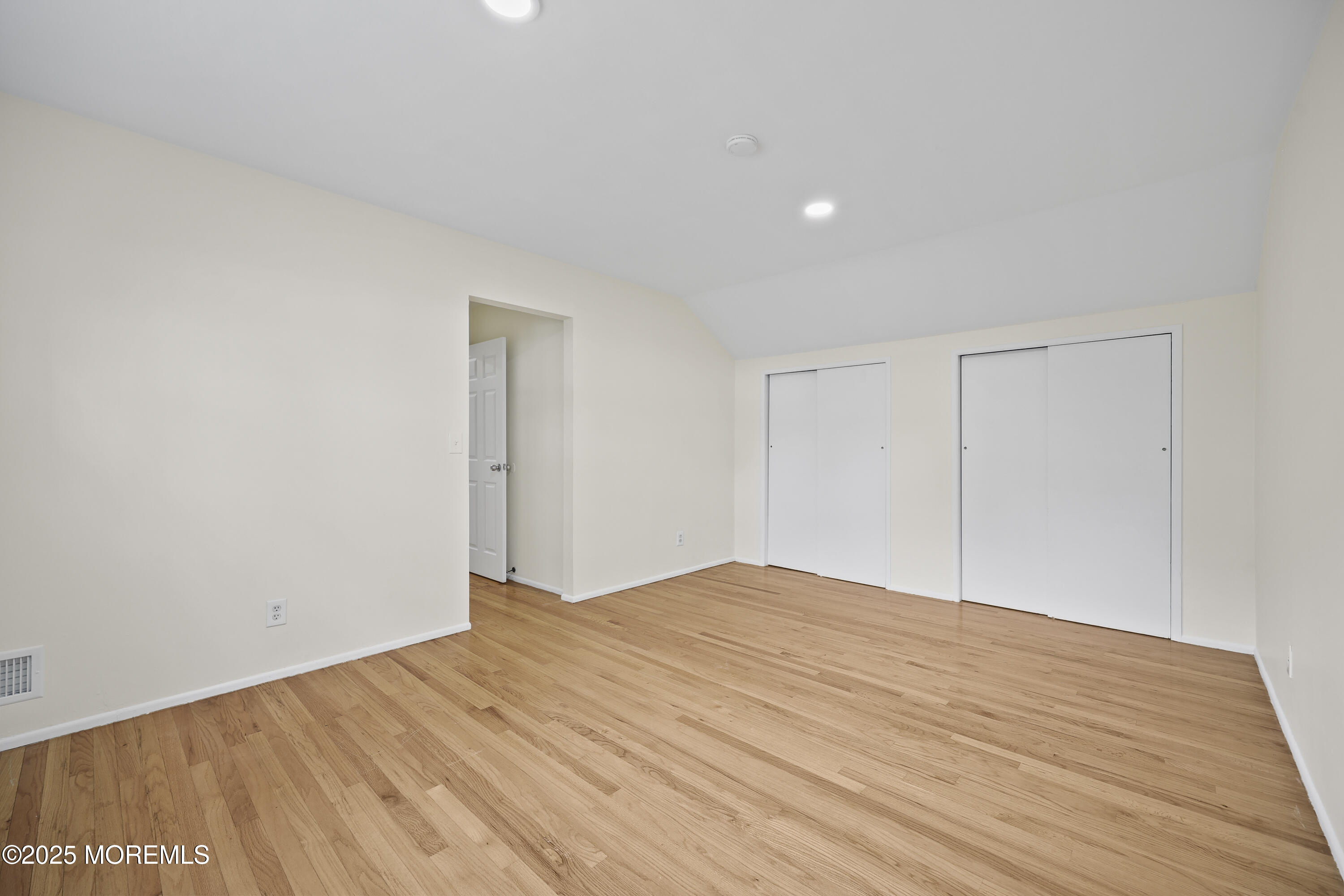 12 Mayfair Road Holmdel, NJ 07733 - Photo 27 of 38 a view of empty room with wooden floor