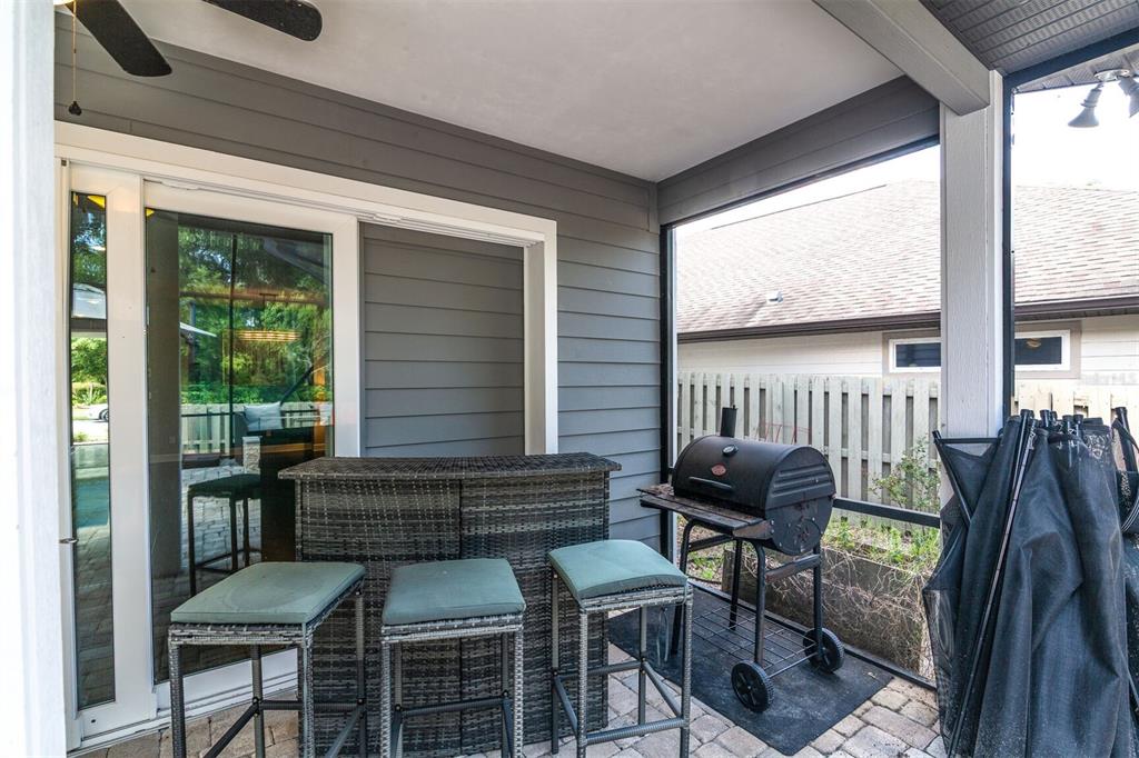 4855 Southwest 64th Road Gainesville, FL 32608 - Photo 36 of 44 a view of a balcony with chairs