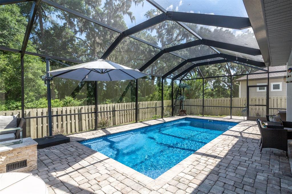 4855 Southwest 64th Road Gainesville, FL 32608 - Photo 39 of 44 a view of a backyard