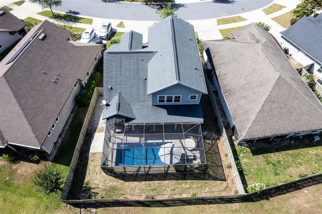 4855 Southwest 64th Road Gainesville, FL 32608 - Photo 43 of 44 an aerial view of a house with a yard